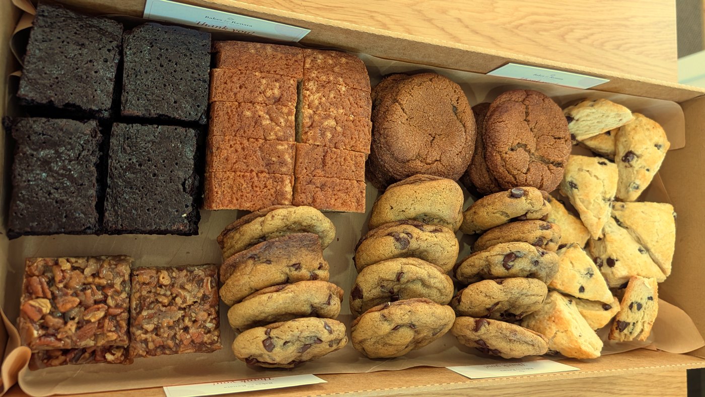 Assorted bakery box with cookies, pound cake, and mini scones
