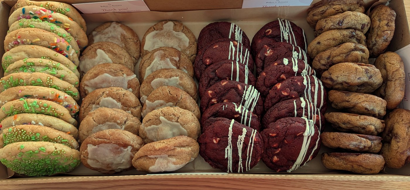 A long box of assorted homemade cookies in four flavors